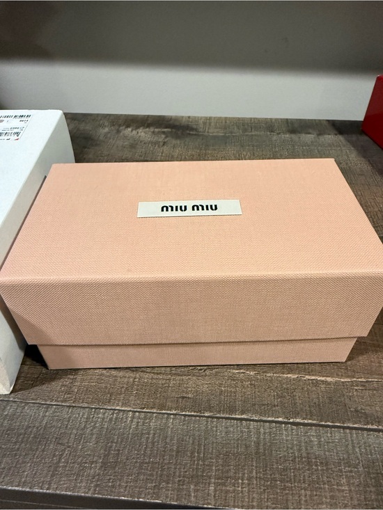 Miu Miu Rimless Sunglasses with Mauve Lenses and Gold Trim. main image 10